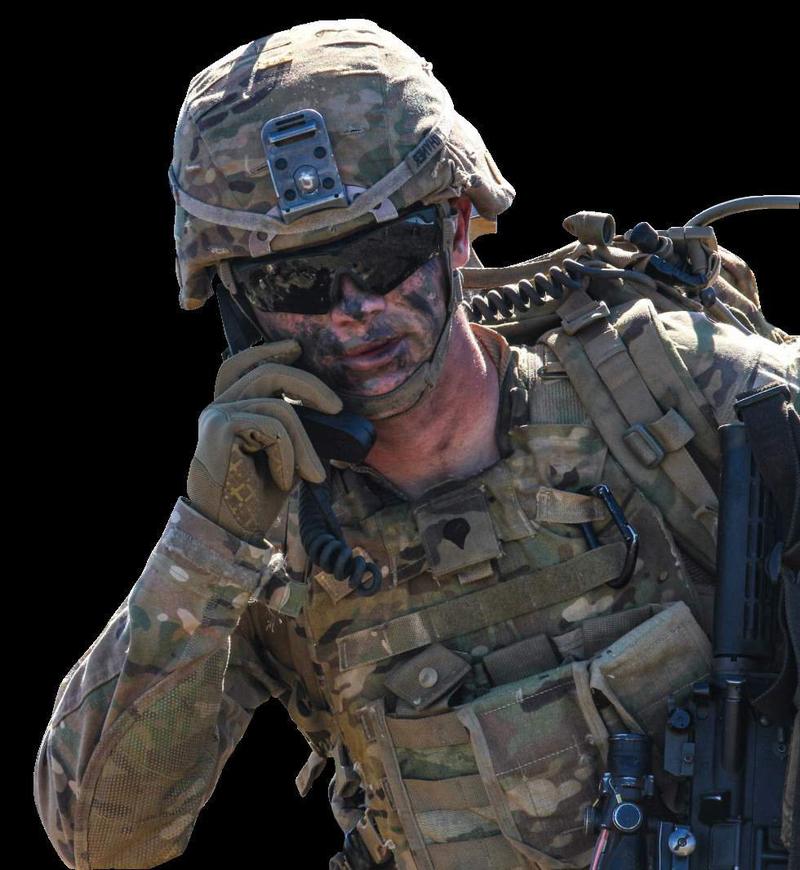 Soldier using a tactical radio handset